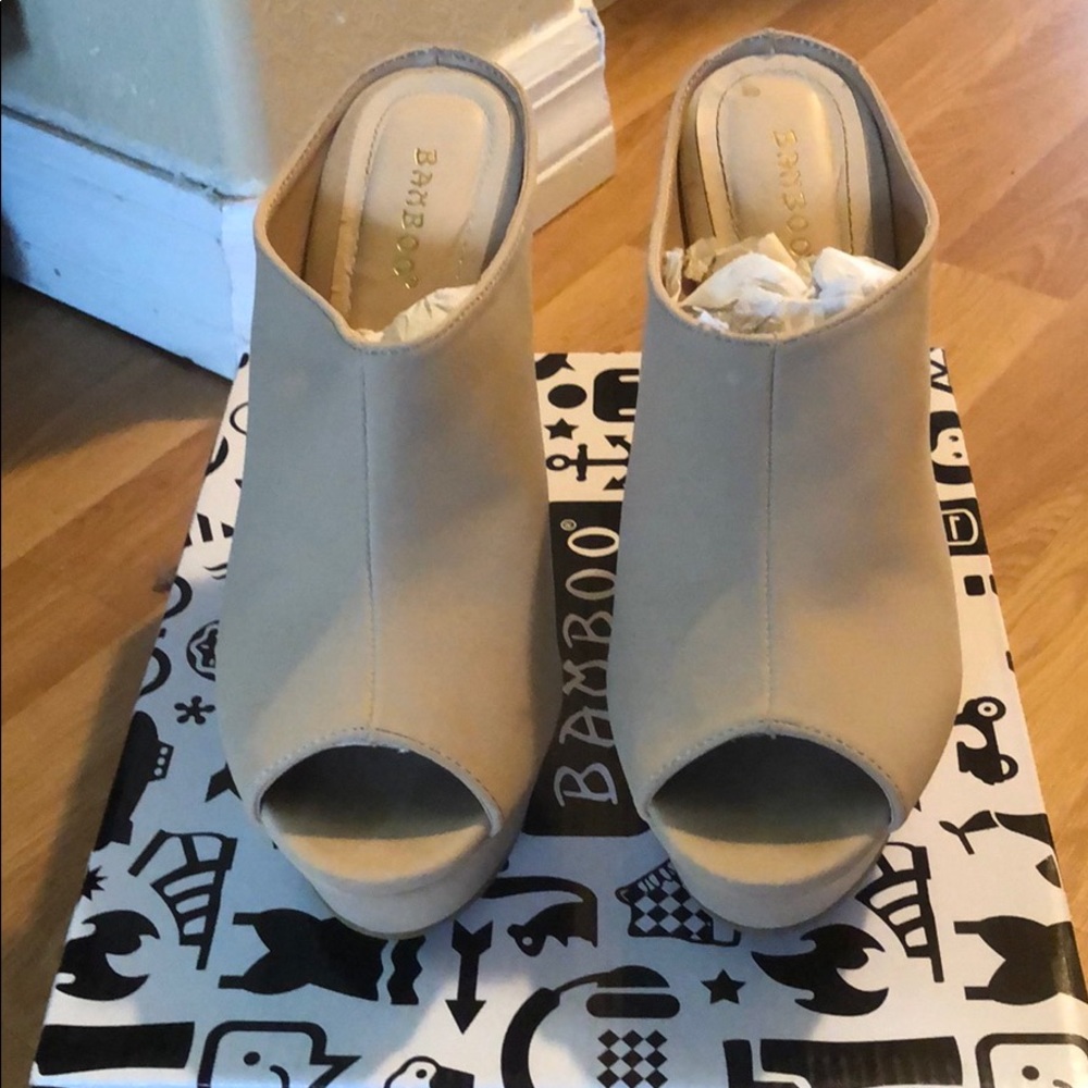 Like new nude platform shoes